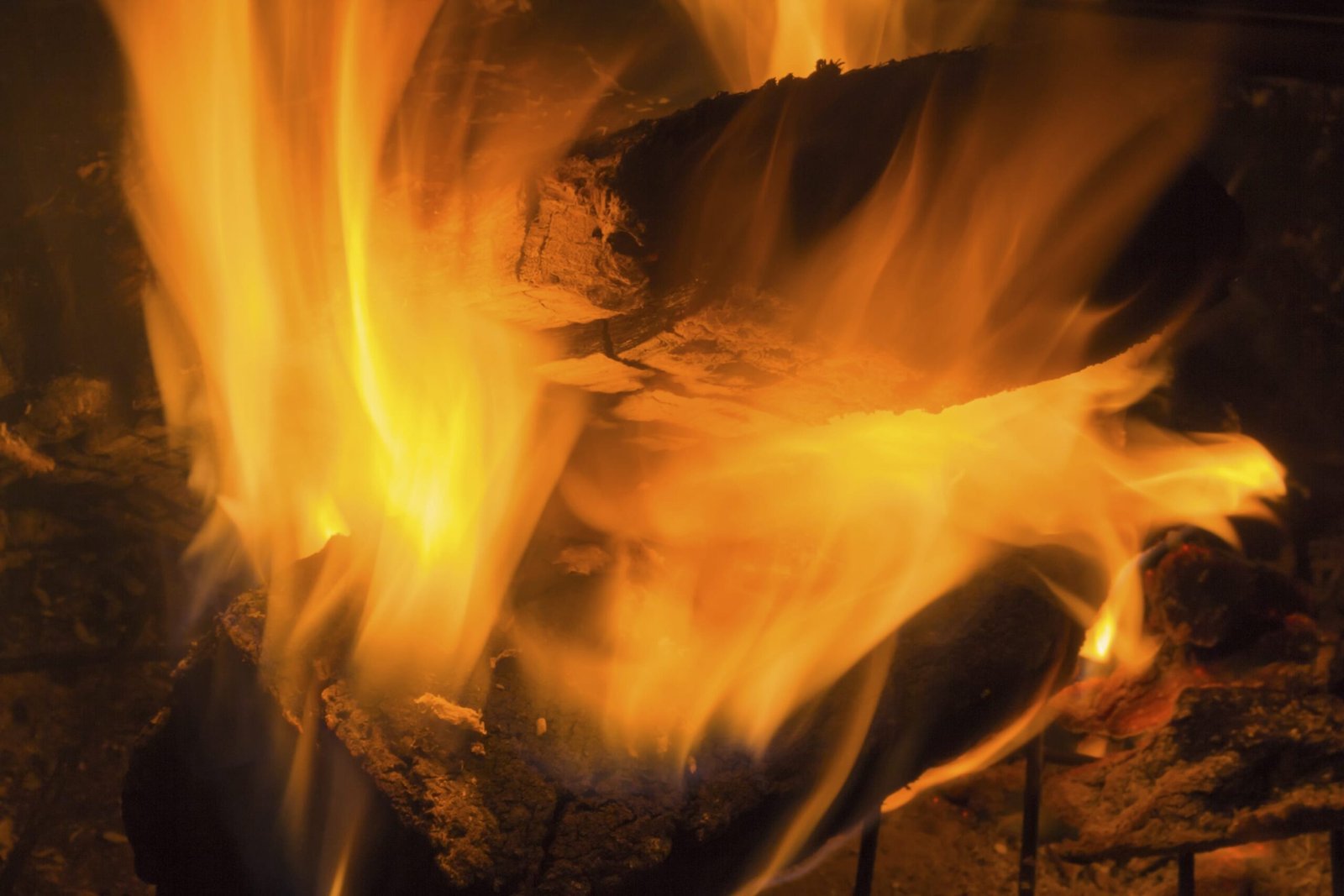 Outdoor camp fire fire pit ablaze for summer vacation background