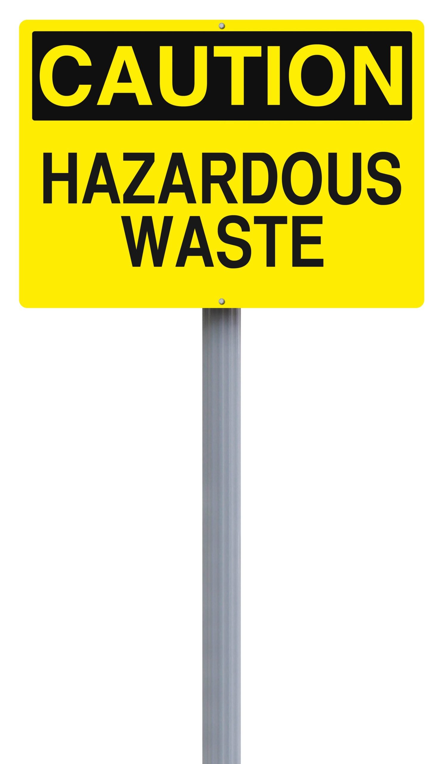 A caution sign indicating Hazardous Waste